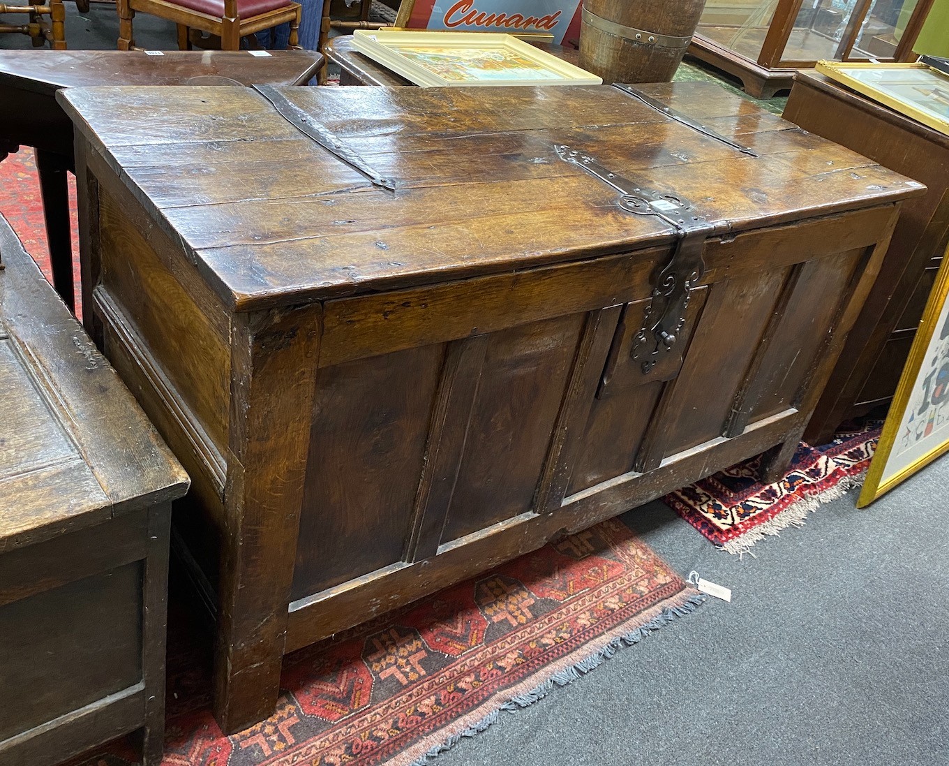 A large 19th century or earlier Provincial French iron bound coffer, length 152cm, depth 64cm, height 81cm